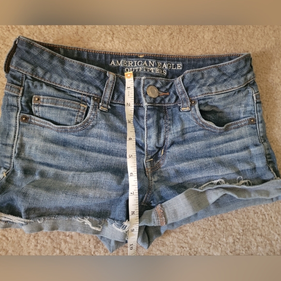Bundle of four shorts size 4. Levi's, American Eagle,  Express. - Picture 5 of 15